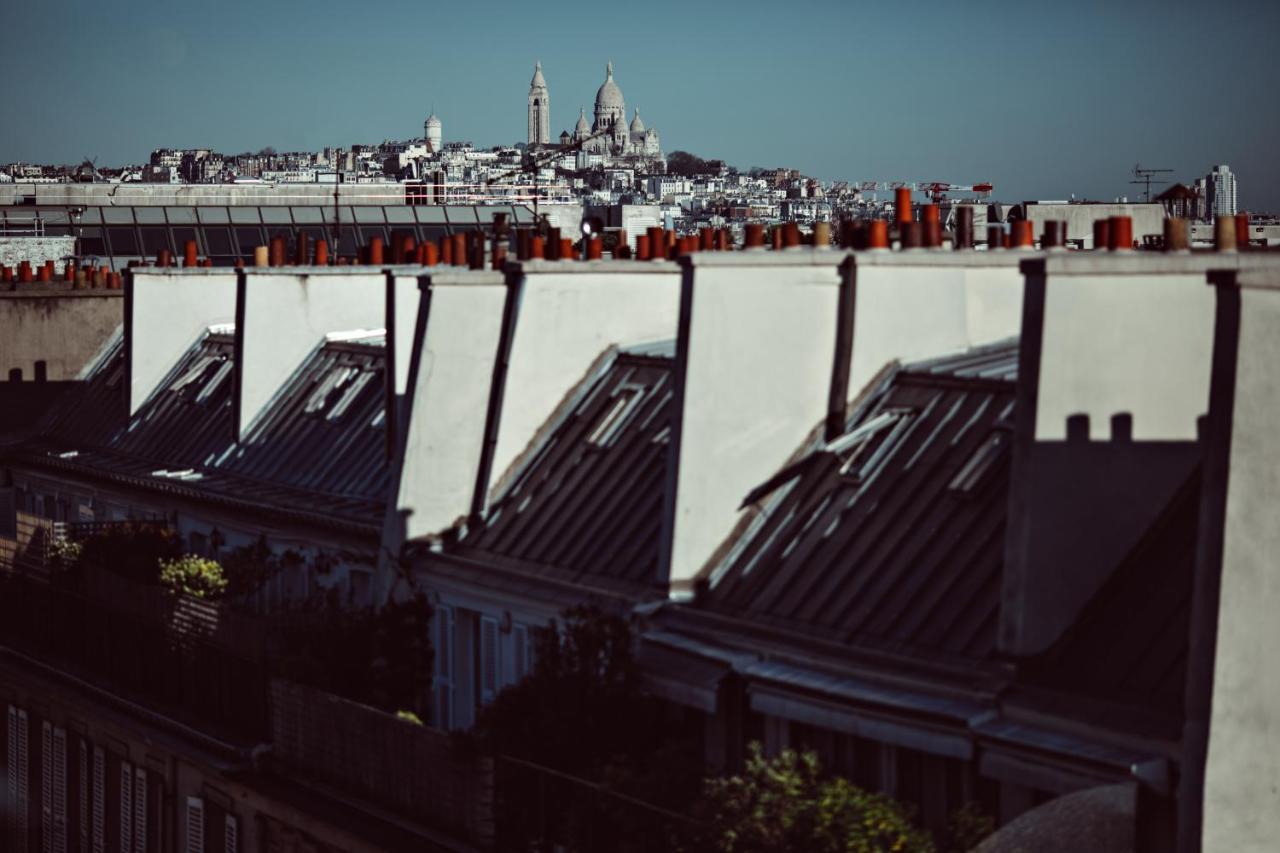 Monsieur George Hotel & Spa - Champs-Elysees Παρίσι Εξωτερικό φωτογραφία View of the roofs of Paris